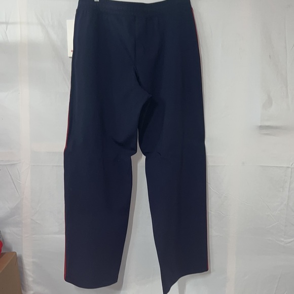 NWT Lululemon Cover your Tracks pants. Size 12. Red, white, navy blue.
LL22 - Picture 7 of 12